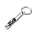 Federbein Schlüsselanhänger aus Metall, Silber/Schwarz